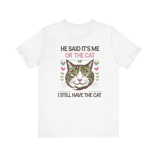 Me or the Cat Valentine's Tee A humorous T-shirt design that expresses the love and preference for cats in a playful way. The tee provides a casual and comfortable vibe, perfect for cat lovers of all ages to wear in everyday situations. Ideal for cat owne