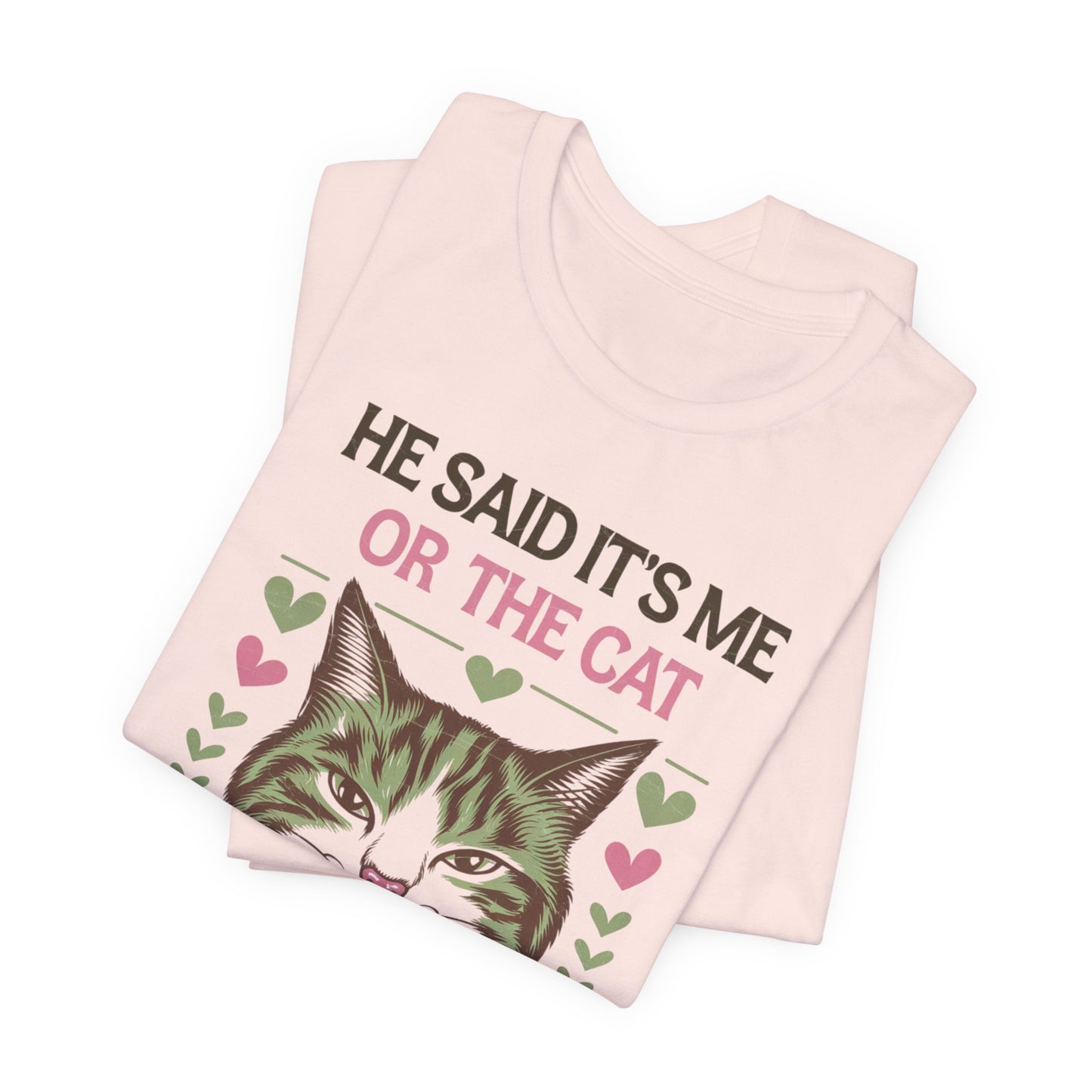 Me or the Cat Valentine's Tee A humorous T-shirt design that expresses the love and preference for cats in a playful way. The tee provides a casual and comfortable vibe, perfect for cat lovers of all ages to wear in everyday situations. Ideal for cat owne