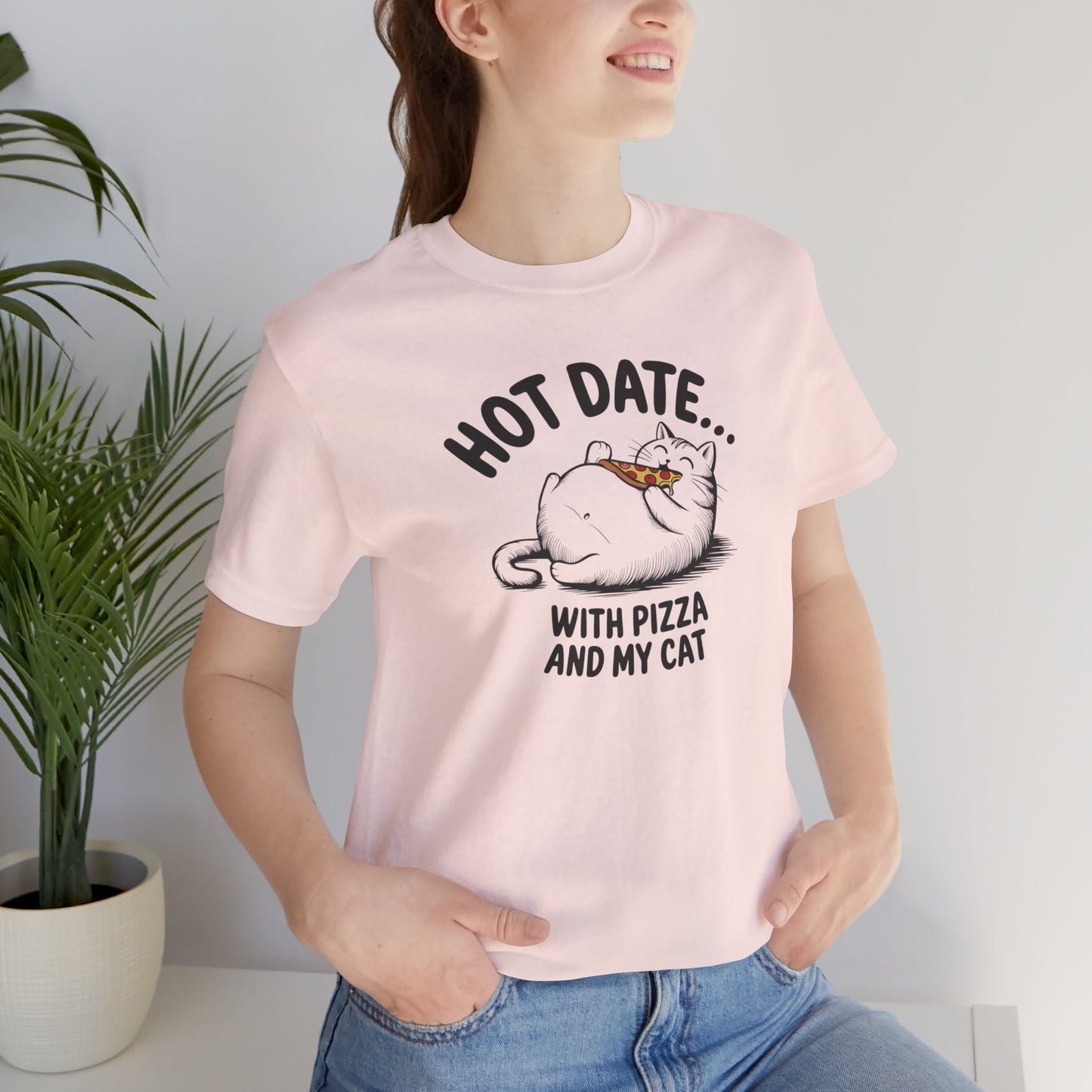 Hot Date With Pizza Cat Tee This T-Shirt features a fun design of a hot date with pizza and a cat, perfect for those who enjoy cozy nights in or love their furry companions. It's a great addition to a casual wardrobe and would make a great gift for cat lo
