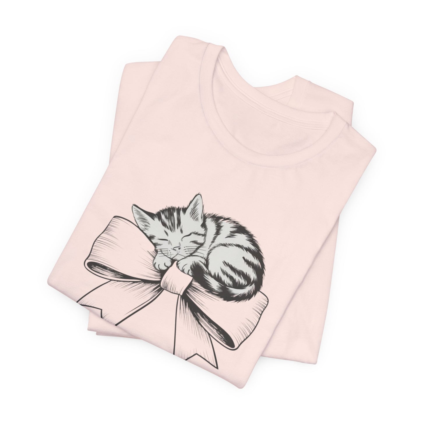 Kitten Bow Valentine's Day Tee This kitten bow Valentines t-shirt exudes a cute and adorable vibe, perfect for celebrating Valentine's Day or showing some love year-round. Product features- Unisex jersey short sleeve tee- Made with 100% lightweight cotton