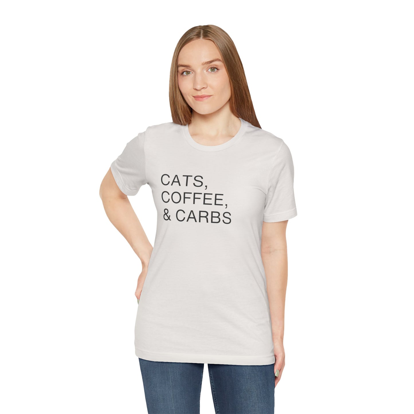 Cats, Coffee, and Carbs, Minimalist Tee This tee is a must-have for any proud cat parent who can't get enough of their furry friends, their daily coffee fix, and their favorite comfort foods. Wear it as a badge of honor and connect with fellow cat lovers