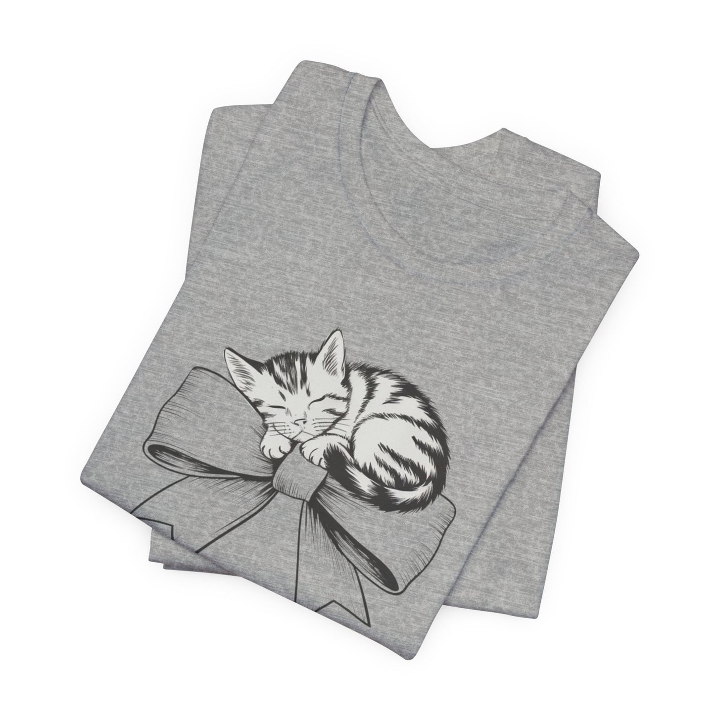 Kitten Bow Valentine's Day Tee This kitten bow Valentines t-shirt exudes a cute and adorable vibe, perfect for celebrating Valentine's Day or showing some love year-round. Product features- Unisex jersey short sleeve tee- Made with 100% lightweight cotton