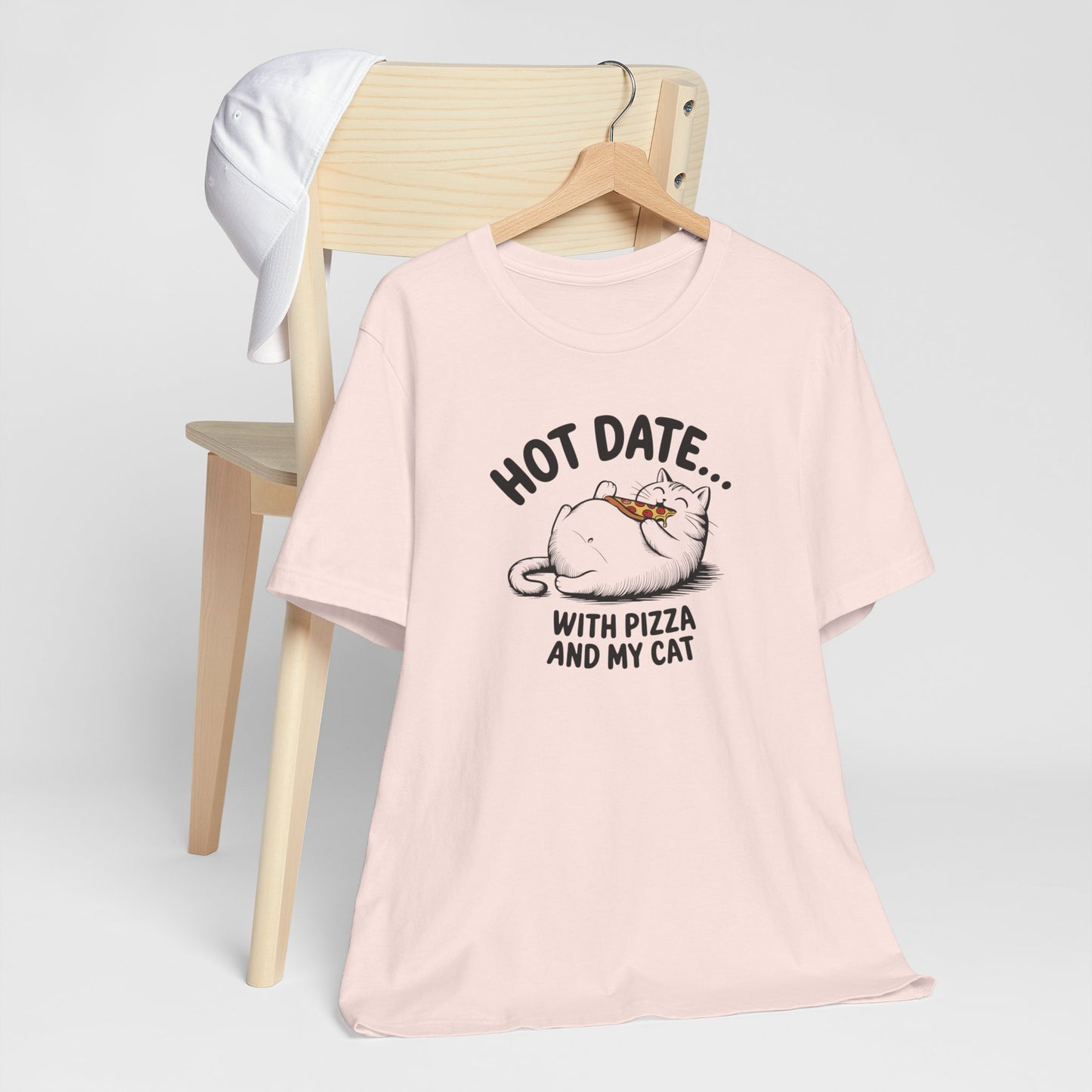 Hot Date With Pizza Cat Tee This T-Shirt features a fun design of a hot date with pizza and a cat, perfect for those who enjoy cozy nights in or love their furry companions. It's a great addition to a casual wardrobe and would make a great gift for cat lo