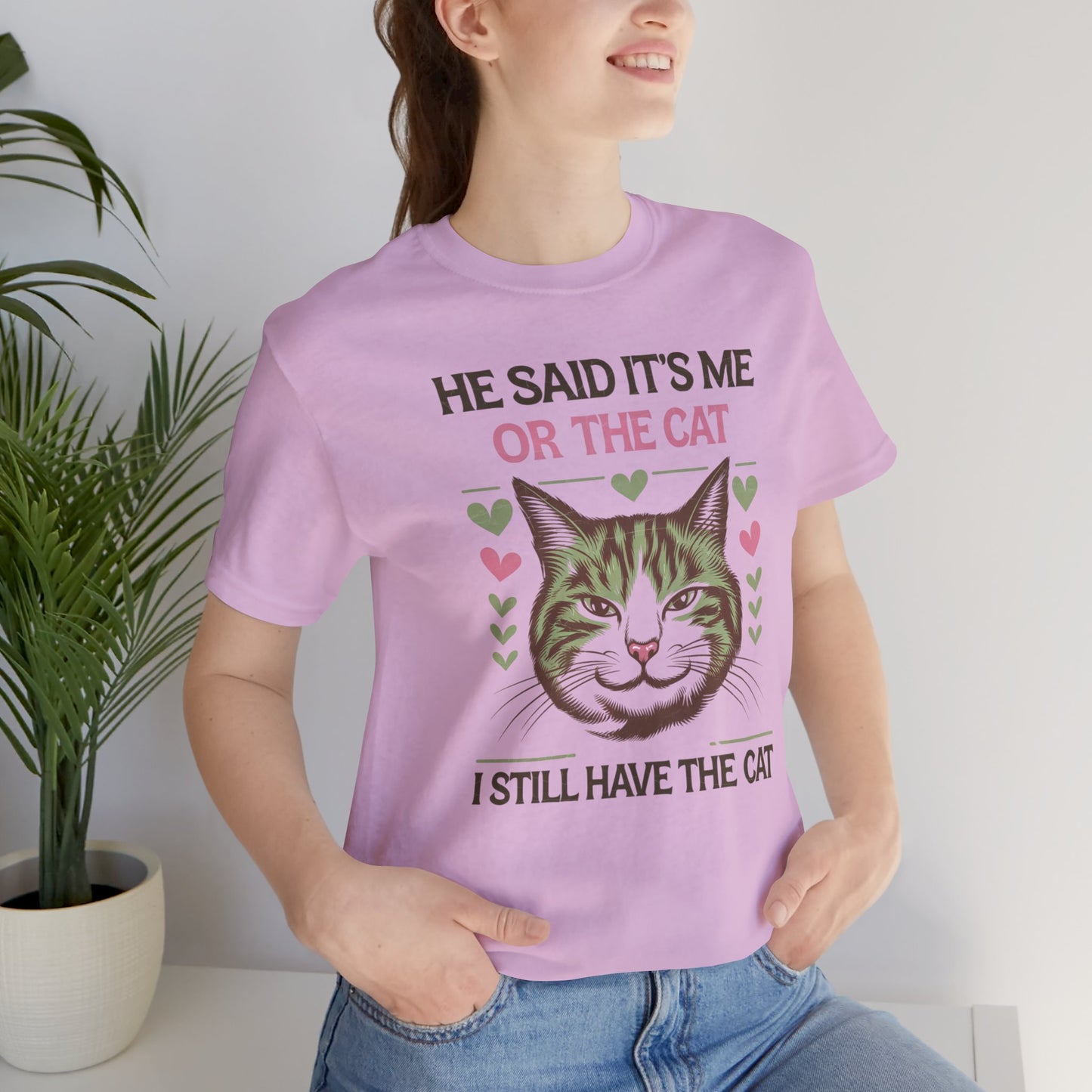 Me or the Cat Valentine's Tee A humorous T-shirt design that expresses the love and preference for cats in a playful way. The tee provides a casual and comfortable vibe, perfect for cat lovers of all ages to wear in everyday situations. Ideal for cat owne