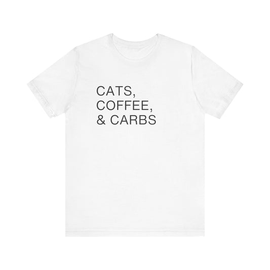 Cats, Coffee, and Carbs, Minimalist Tee This tee is a must-have for any proud cat parent who can't get enough of their furry friends, their daily coffee fix, and their favorite comfort foods. Wear it as a badge of honor and connect with fellow cat lovers