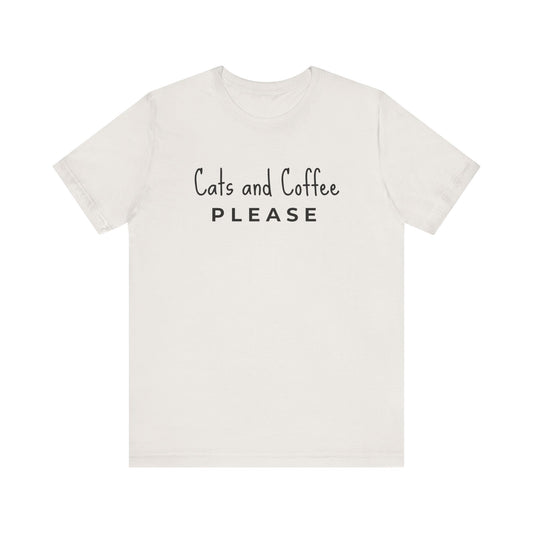 Cats and Coffee Please Minimalist Tee Fuel your day with the perfect blend of feline and caffeine! Our "Cats and Coffee Please Tee" is the ultimate must-have for cat lovers and coffee addicts alike. Product features- Unisex jersey short sleeve tee- Made w