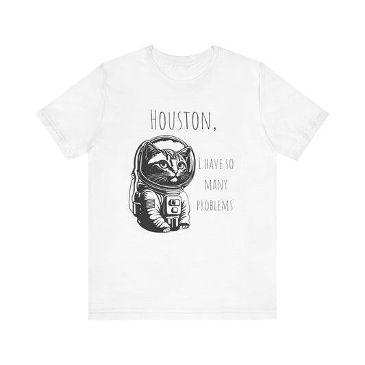 Astronaut Cat Tee - Funny Cat Houston We Have Many Problems This funny cat astronaut design T-shirt brings a playful and whimsical vibe to your wardrobe. Perfect for cat lovers, space enthusiasts, and those with a quirky sense of humor. Ideal for casual w