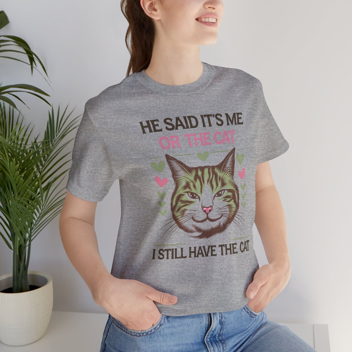Me or the Cat Valentine's Tee A humorous T-shirt design that expresses the love and preference for cats in a playful way. The tee provides a casual and comfortable vibe, perfect for cat lovers of all ages to wear in everyday situations. Ideal for cat owne