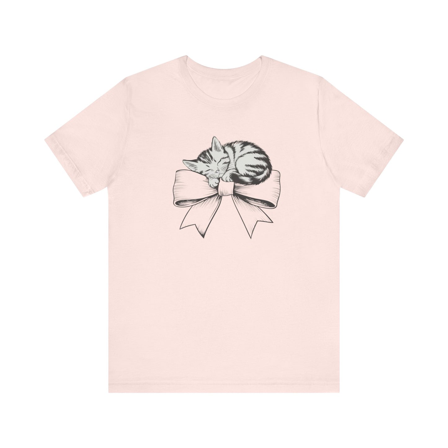 Kitten Bow Valentine's Day Tee This kitten bow Valentines t-shirt exudes a cute and adorable vibe, perfect for celebrating Valentine's Day or showing some love year-round. Product features- Unisex jersey short sleeve tee- Made with 100% lightweight cotton