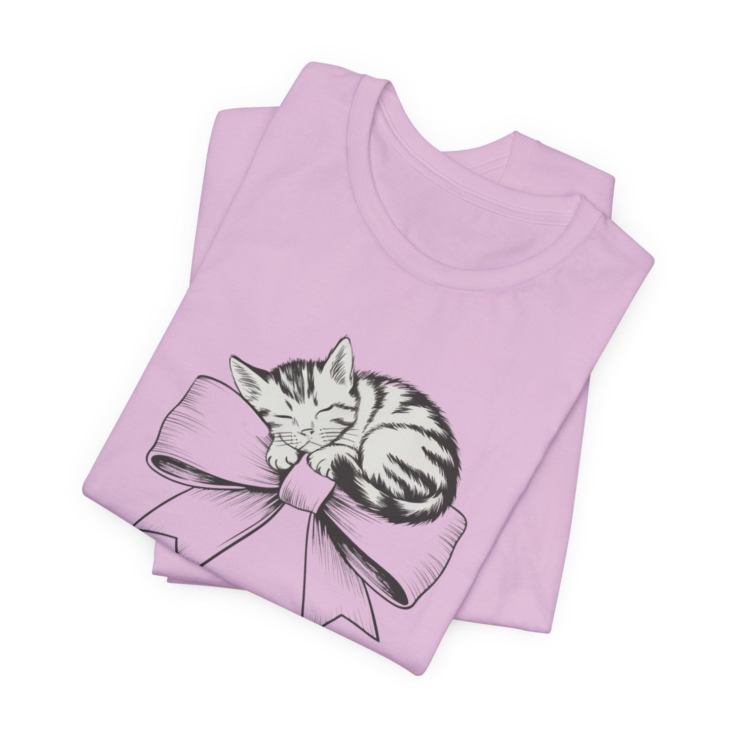 Kitten Bow Valentine's Day Tee This kitten bow Valentines t-shirt exudes a cute and adorable vibe, perfect for celebrating Valentine's Day or showing some love year-round. Product features- Unisex jersey short sleeve tee- Made with 100% lightweight cotton