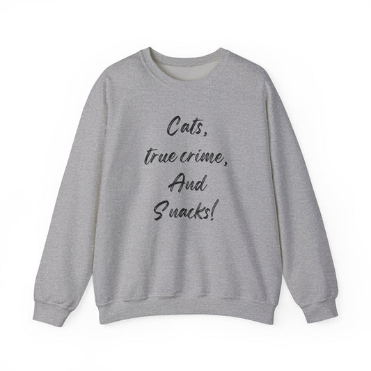 Crewneck Sweatshirt - Cats True Crime and Snacks Design This sweatshirt is perfect for cat lovers who enjoy true crime documentaries and snacks. The cozy fabric blend of cotton and polyester provides warmth during colder months. The classic fit and crew n