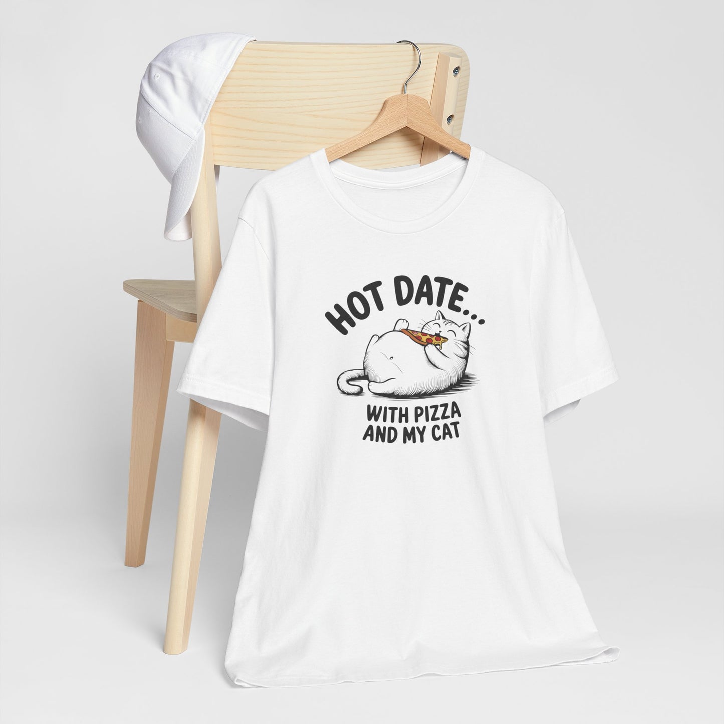 Hot Date With Pizza Cat Tee This T-Shirt features a fun design of a hot date with pizza and a cat, perfect for those who enjoy cozy nights in or love their furry companions. It's a great addition to a casual wardrobe and would make a great gift for cat lo