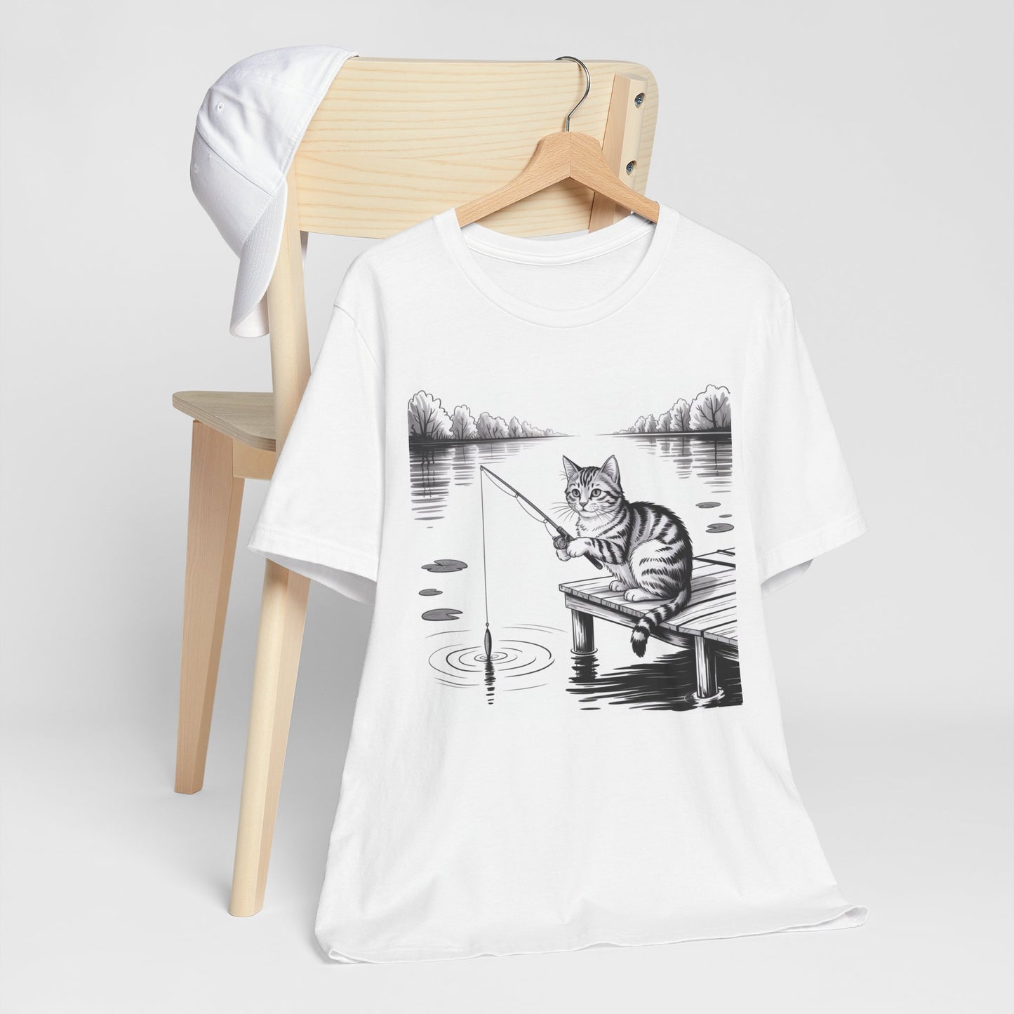 Cat Fishing on the Dock” Graphic Tee – Funny Cat Shirt for Animal Lovers & Fishing Fans