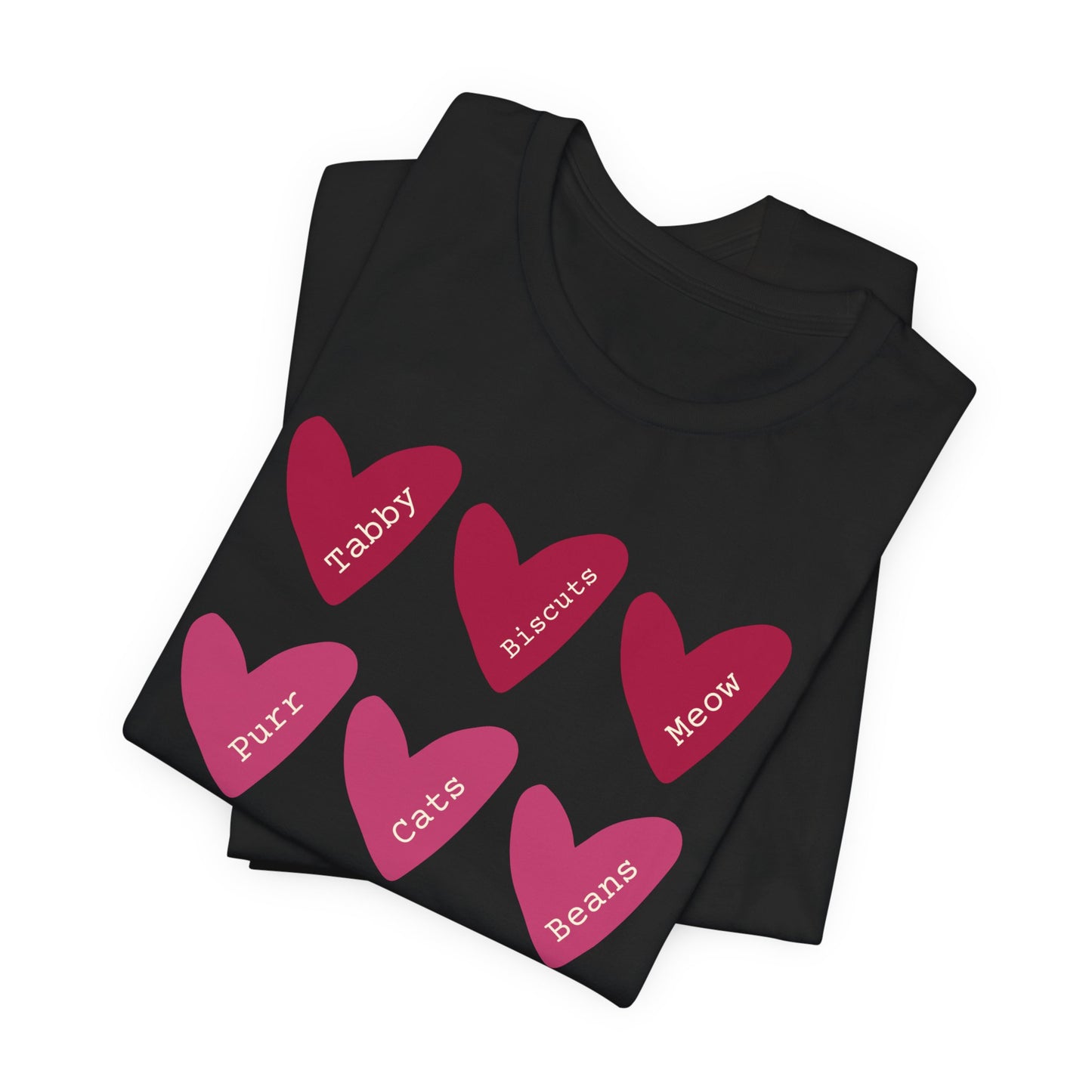 Cat Hearts Valentine’s Day Tshirt This T-Shirt features a cute design of Valentine's Day hearts with various cat types, giving off a playful and festive vibe. It is perfect for cat lovers celebrating Valentine's Day or looking to add a fun touch to their