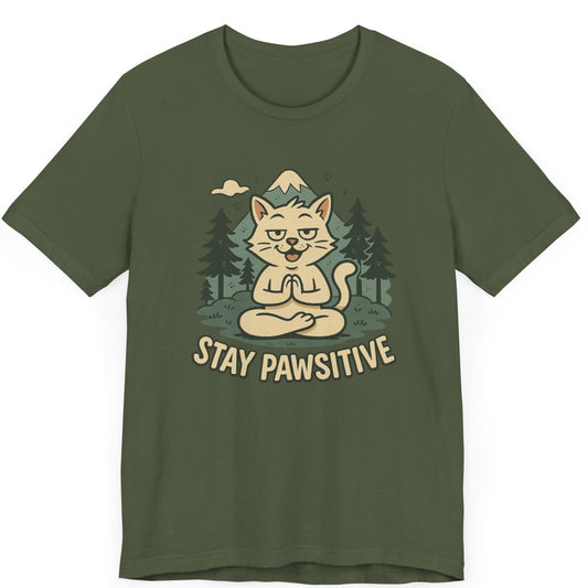 Tshirt featuring a meditating cool cat in front of a mountain and trees with the words tay pawsitive