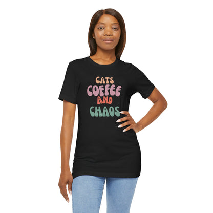 Cats and Coffee and Chaos Tee This shirt celebrates the joyful chaos that comes with loving cats and coffee. Whether you're sipping your morning brew or cuddling your kitty, this shirt lets the world know your passions. Wear it with pride and let the comp