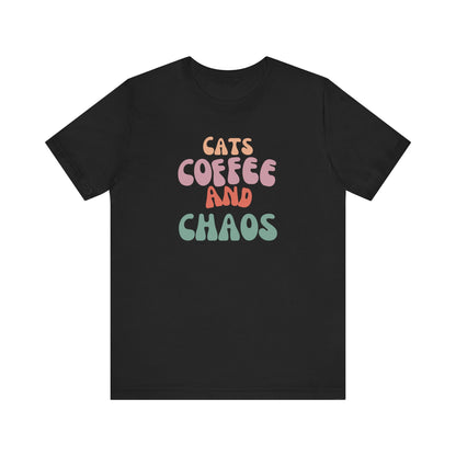 Cats and Coffee and Chaos Tee This shirt celebrates the joyful chaos that comes with loving cats and coffee. Whether you're sipping your morning brew or cuddling your kitty, this shirt lets the world know your passions. Wear it with pride and let the comp