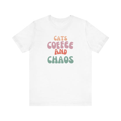Cats and Coffee and Chaos Tee This shirt celebrates the joyful chaos that comes with loving cats and coffee. Whether you're sipping your morning brew or cuddling your kitty, this shirt lets the world know your passions. Wear it with pride and let the comp