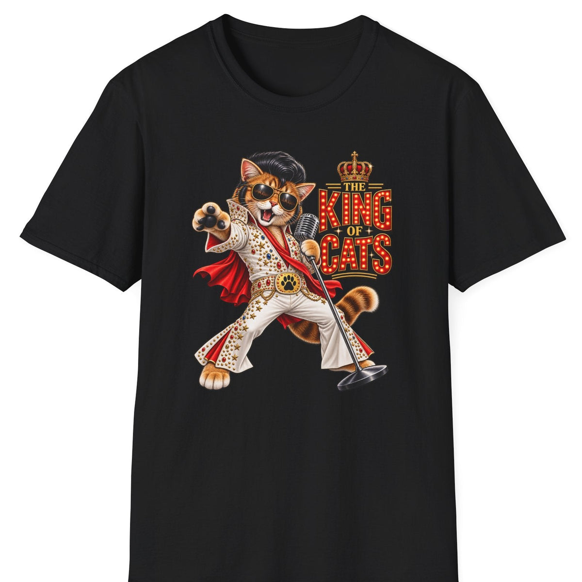 A black short-sleeve crewneck t-shirt featuring a colorful graphic of a cat dressed as Elvis Presley with the text 'THE KING OF CATS' in red and gold.